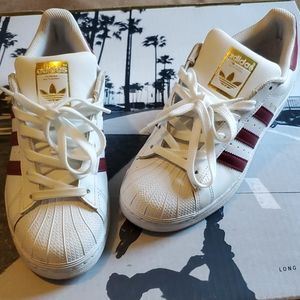 Maroon and white adidas